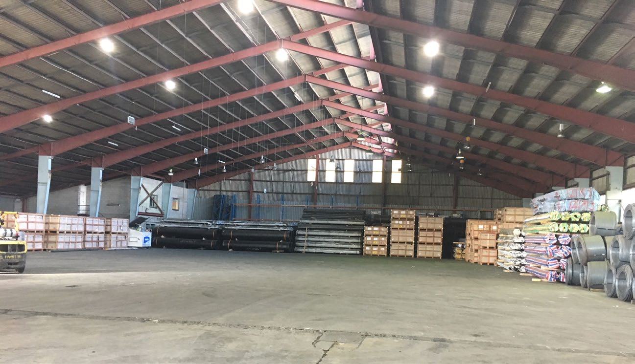 Long warehouse aisle with palletised freight